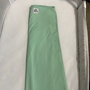 The Ollie World swaddle in Meadow Green. One size